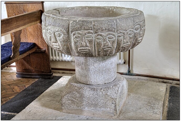 LLANWENOG - Early C13th. Twelve faces.