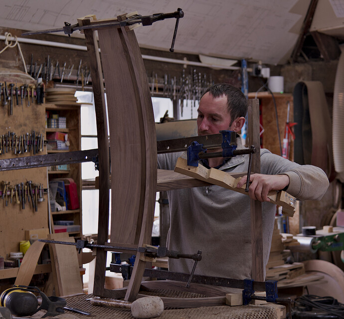 Working on a walnut chair