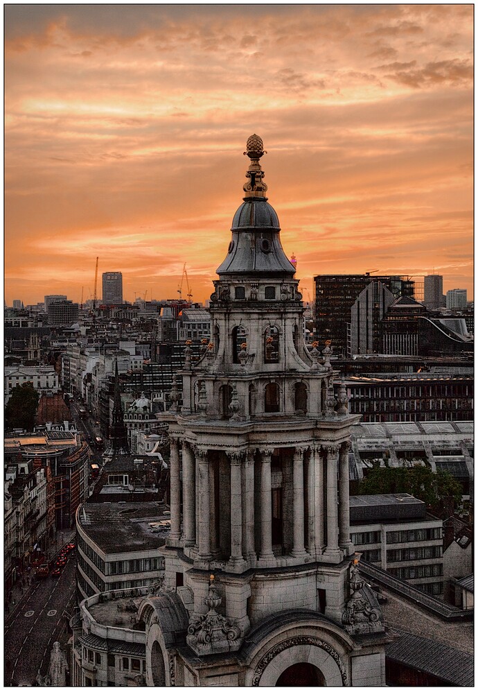ST PAULS (London) CATHEDRAL - Begun 1675 after the Great Fire of London - The West tower from the cupola of St. Pauls at dusk.