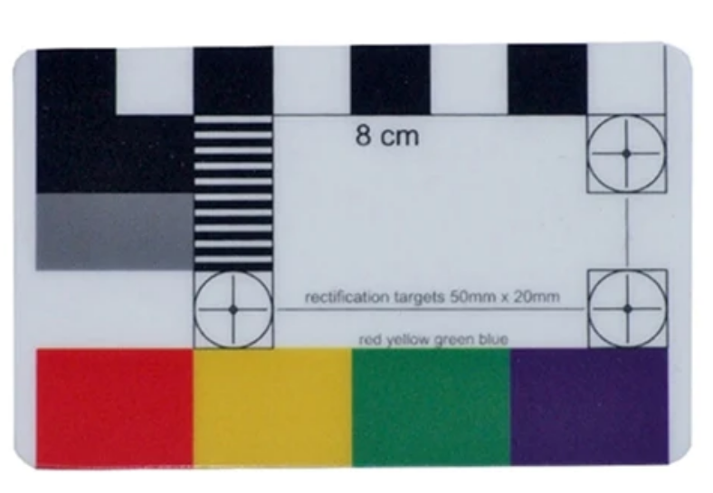 Photograph of a pocket reference scale - this version is credit card sized, with an 8 centimetre scale, a 20 millimetre scale, a three-panel grey card, four colour reference panels, and a rectification target. The reference colours are red, yellow, green, and blue.